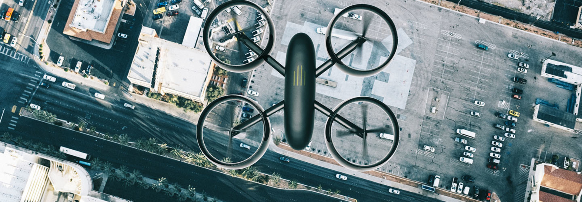 Drone hoovers over city in high angle view