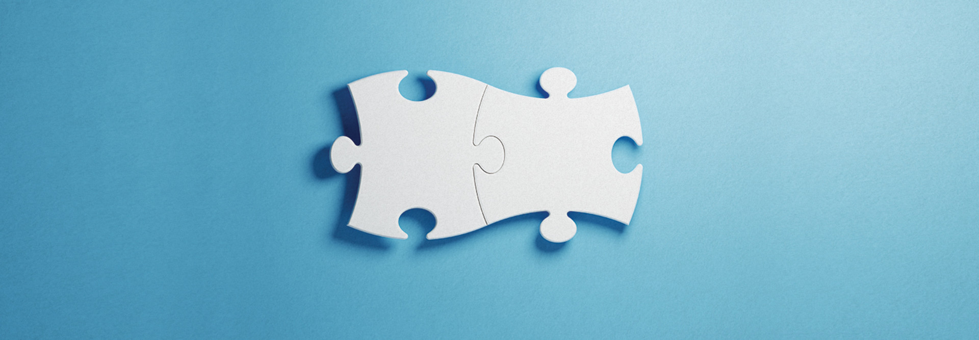 Puzzle pieces fitting together perfectly