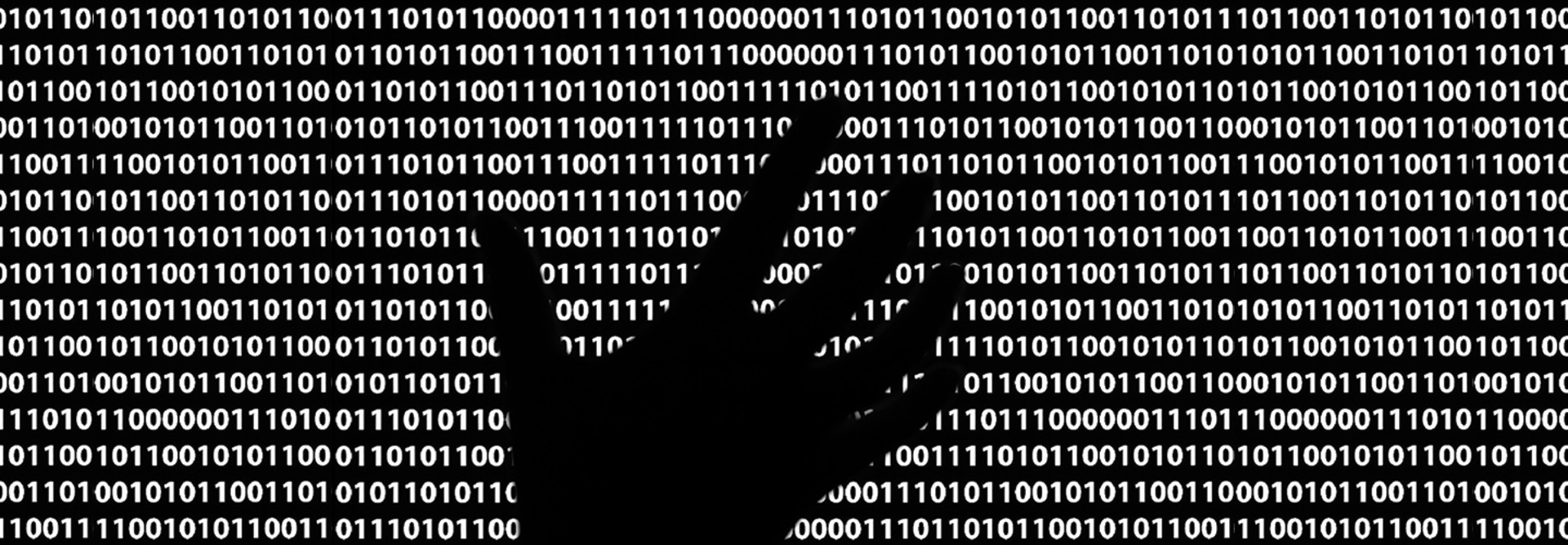 Ominous black hand in lines of code