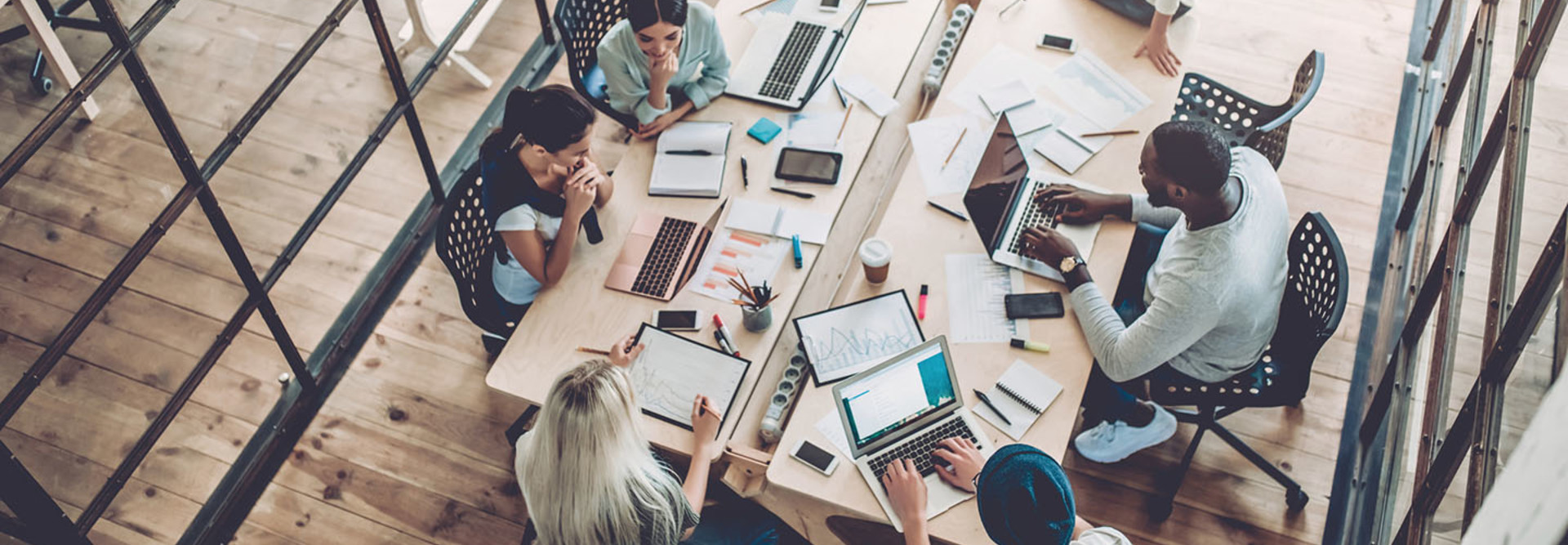 Young people work in modern office.