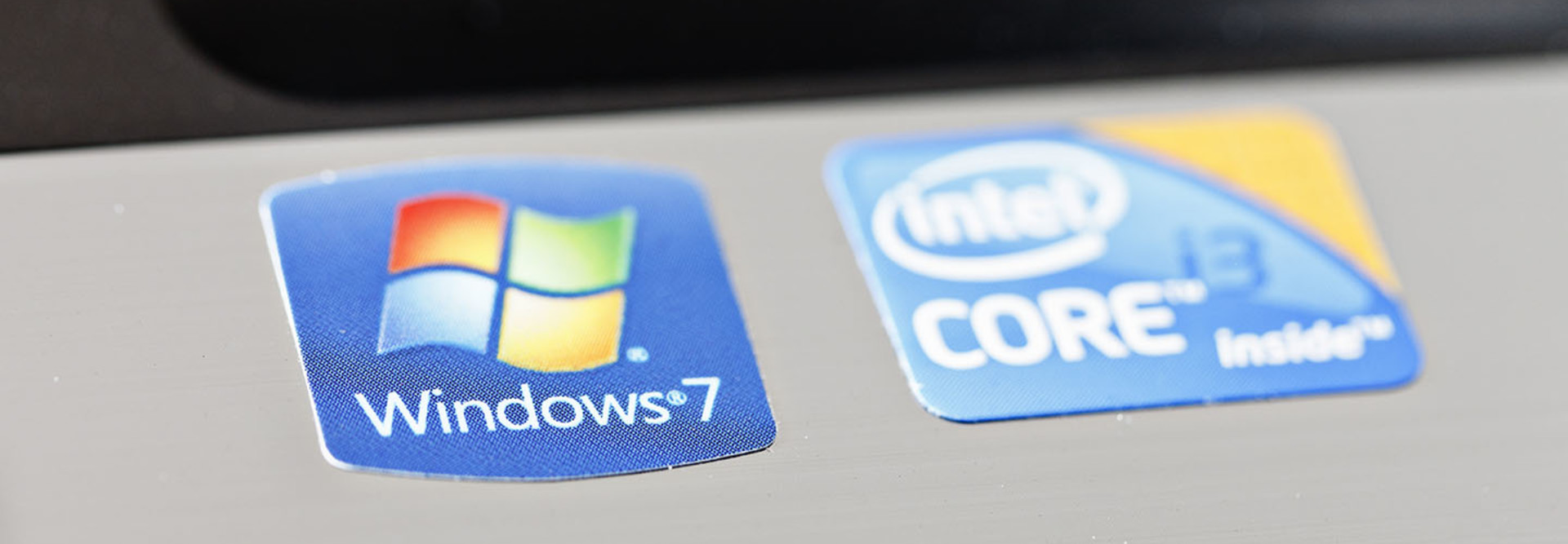 Windows and Intel stickers on laptop computer