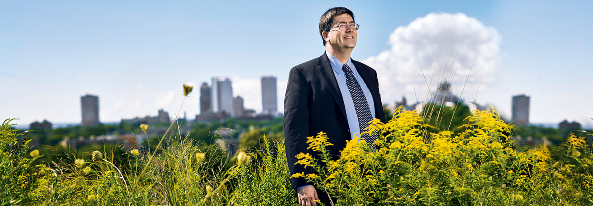 Milwaukee CIO David Henke standing in a public park 