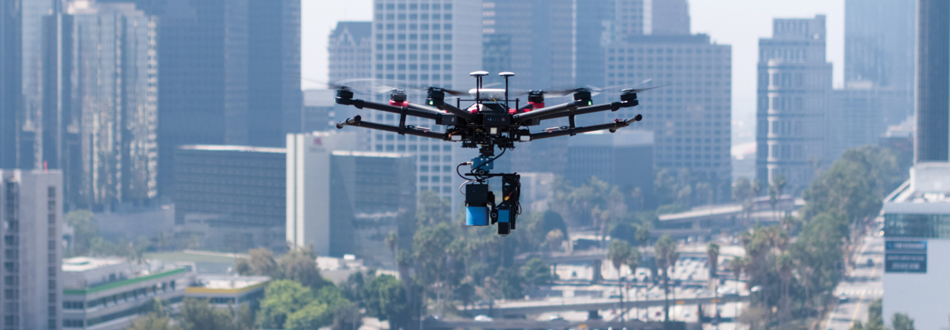 Drone inspecting city buildings 