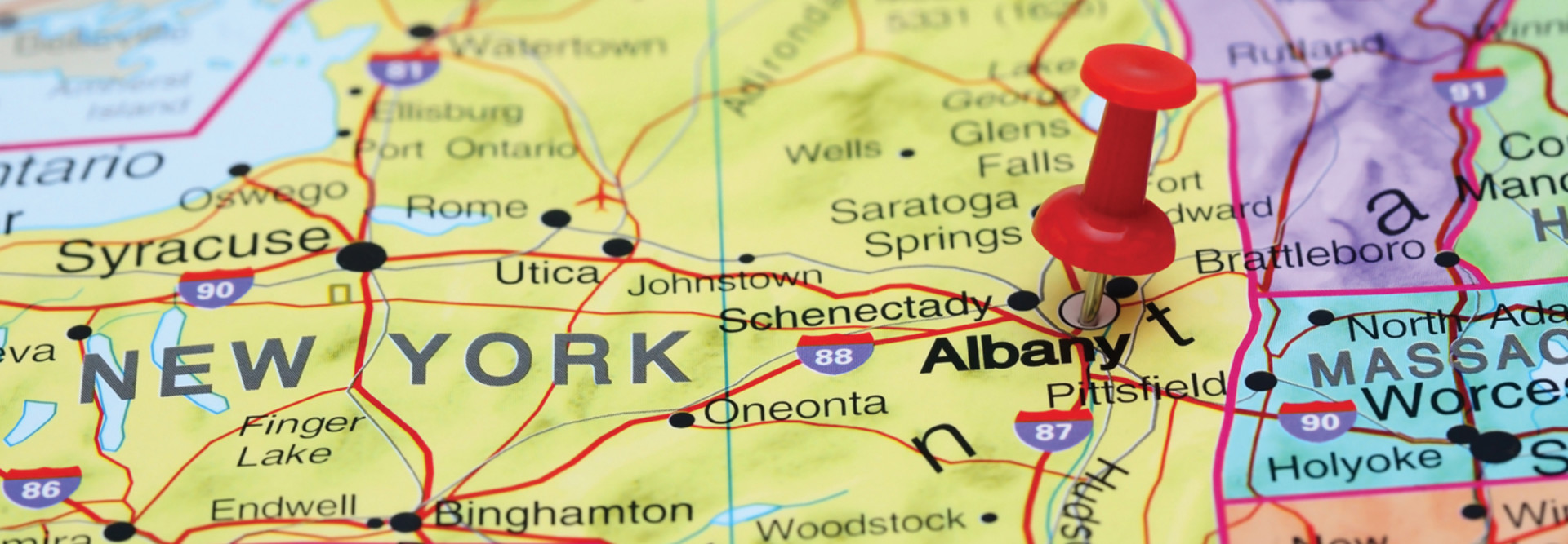 New York State map with a push pin in Albany 