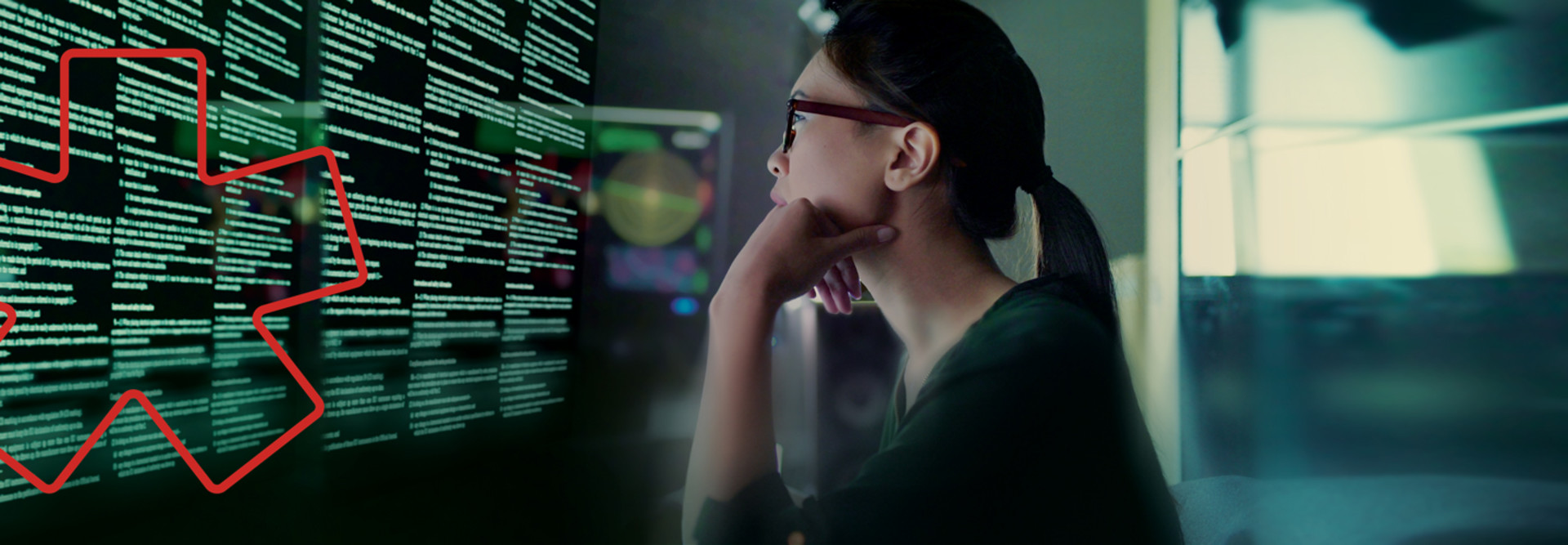 Person reviewing data at computer