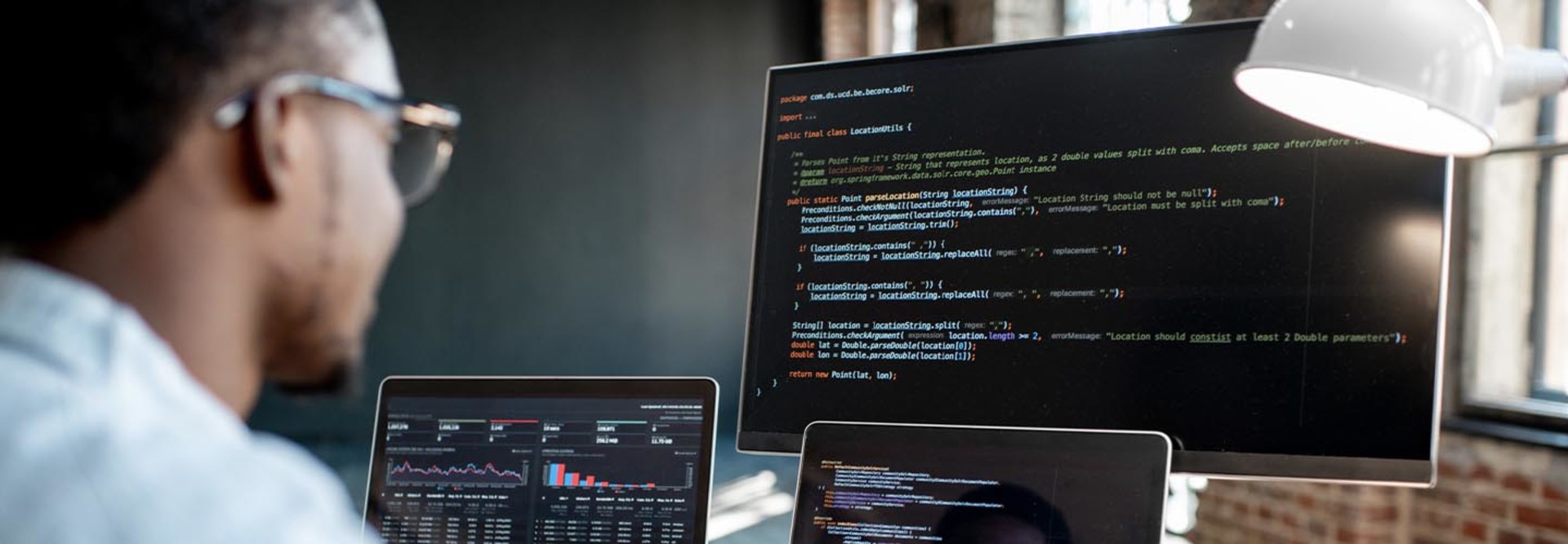 Person coding at computer