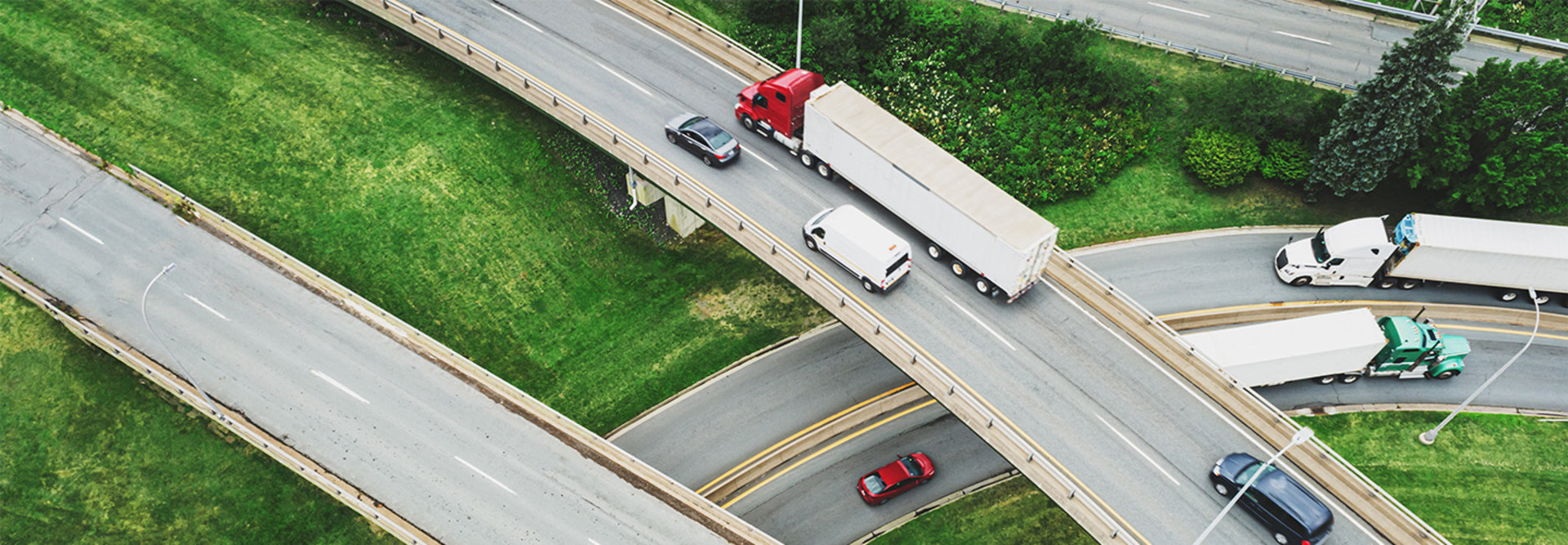 Trucks traveling a highway