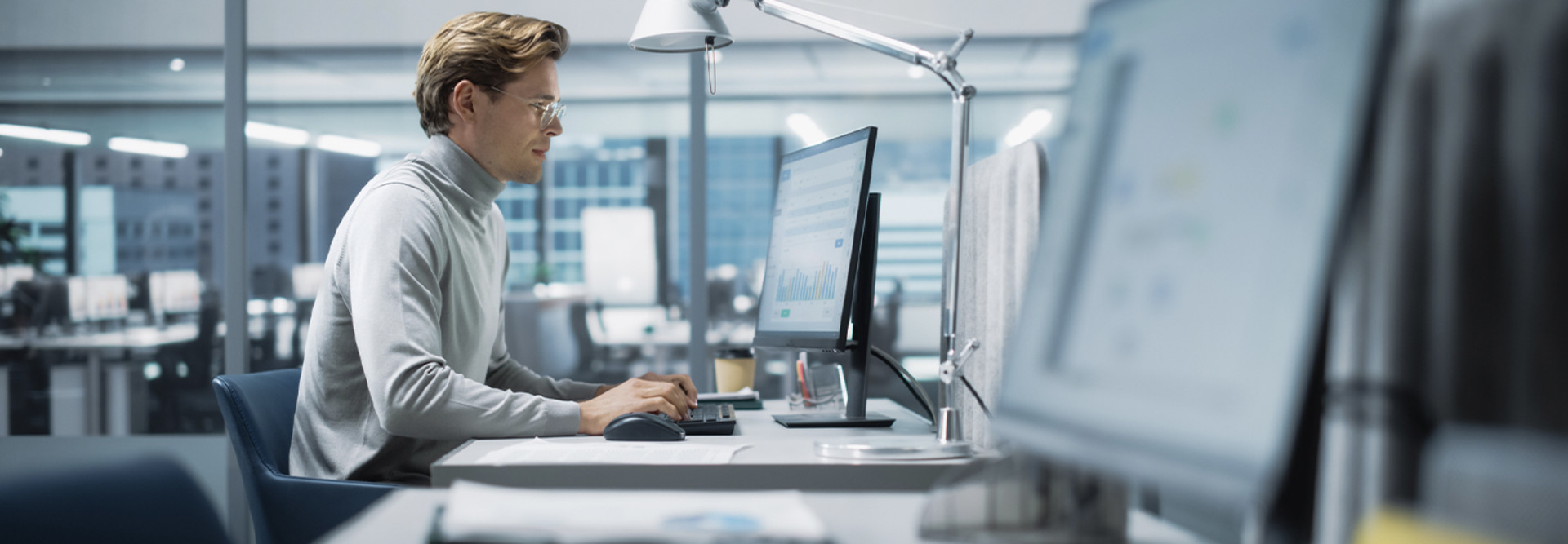 Person working at computer reviewing data