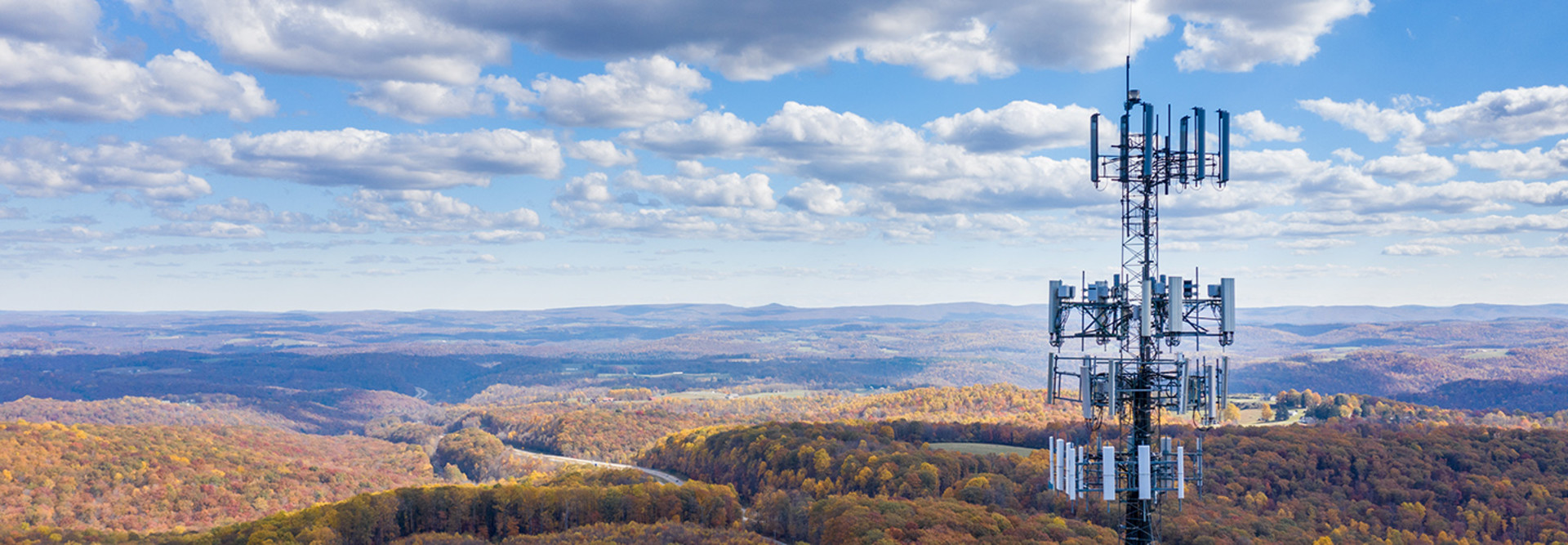 Mobile service tower in rural area.
