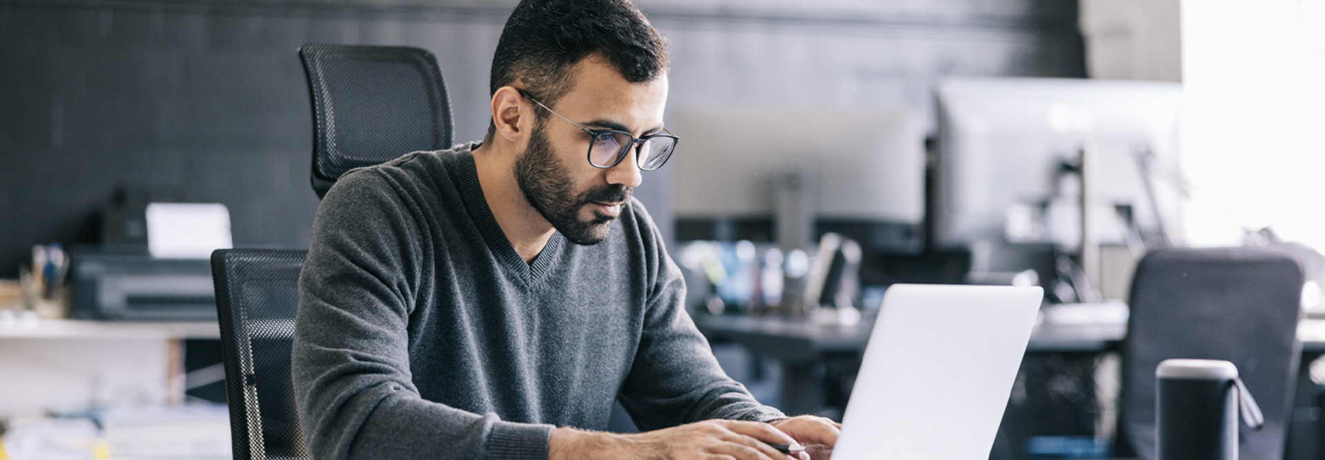 Person working on computer in office
