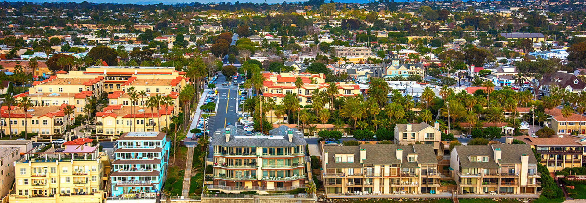Aerial view of condos lining the beach in the northern San Diego community of Carlsbad, California.