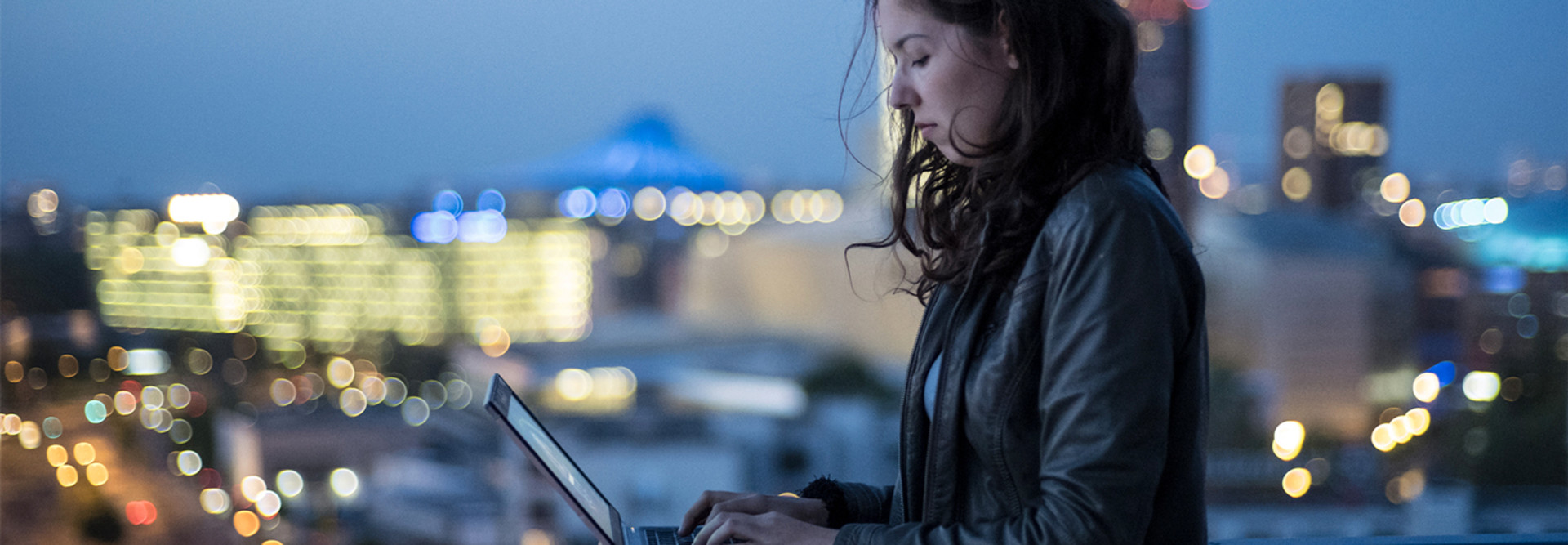 Person using computer outside