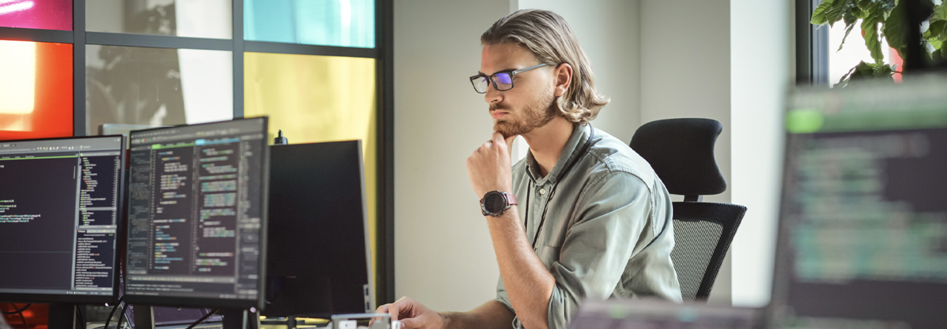 Person coding on computer