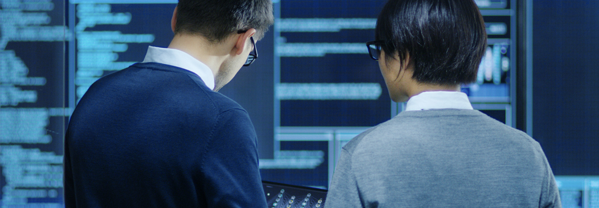 People working in control room