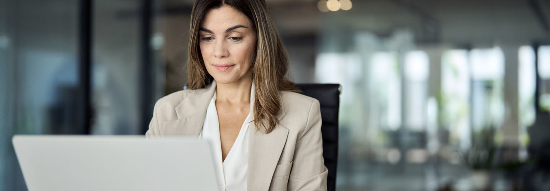 Person using laptop at the office