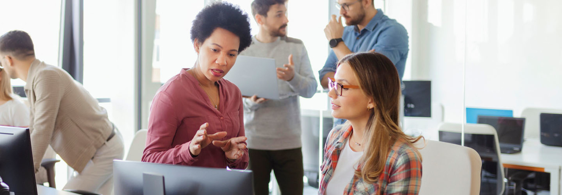 People working in the office together