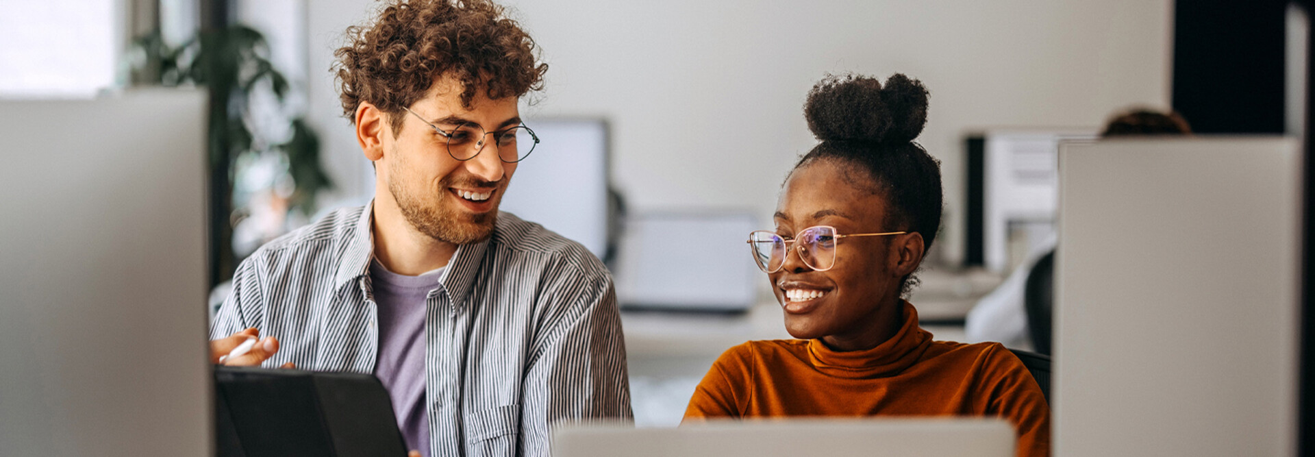 People working in the office together
