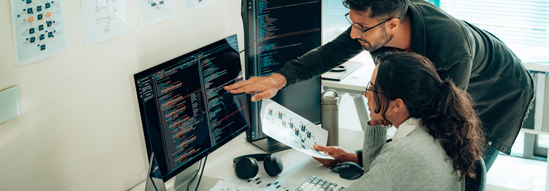 people collaborating on software development