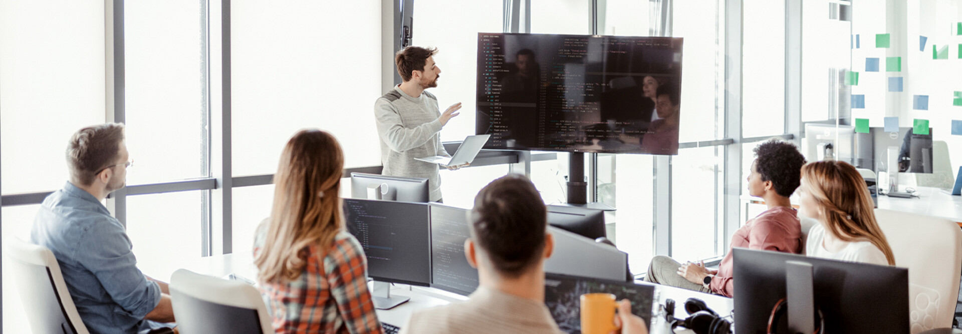 People learning coding on the job