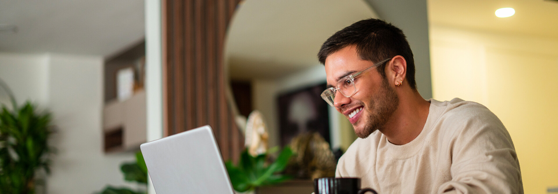 Citizen using laptop in home