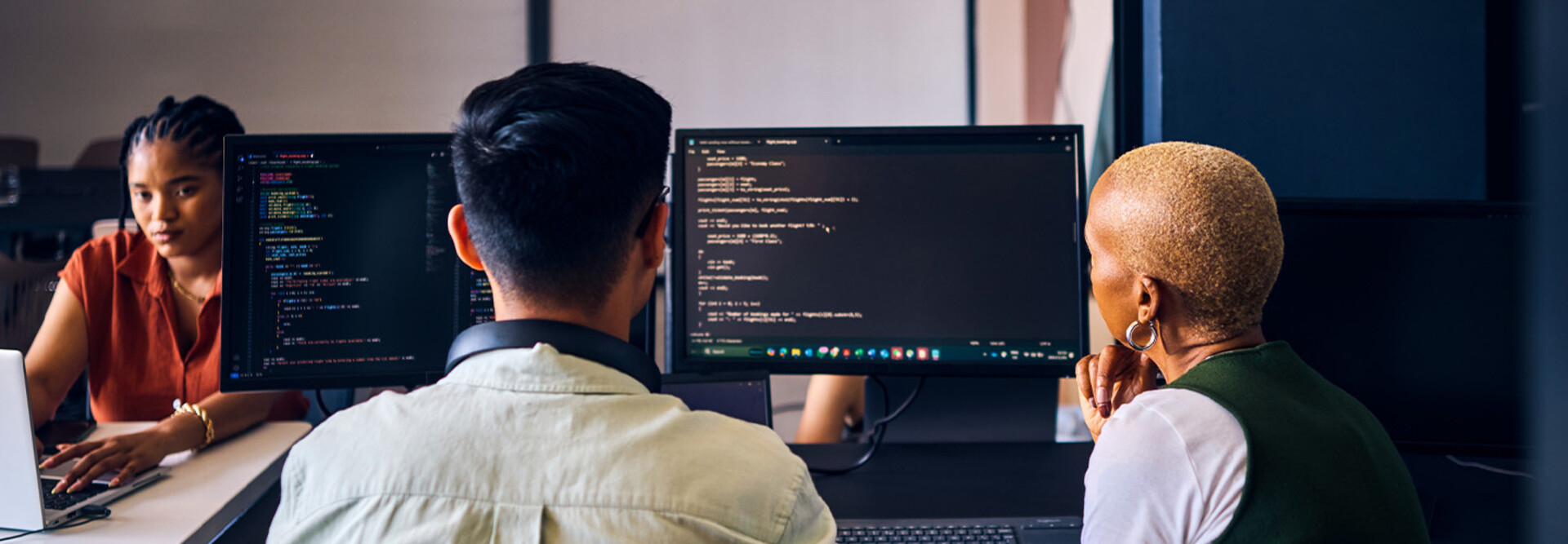 People coding in the office