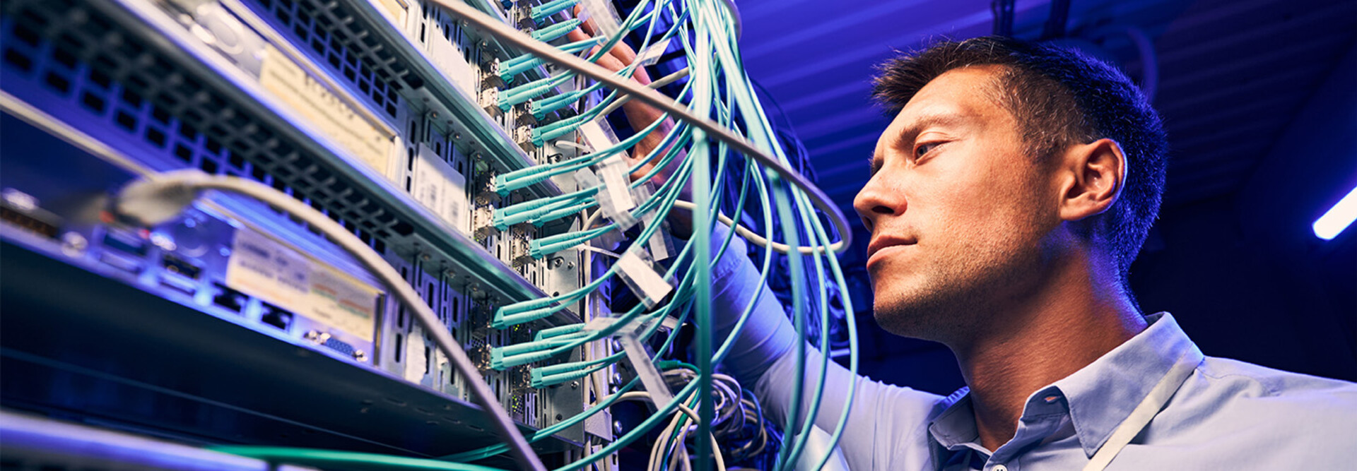 Engineer testing cables