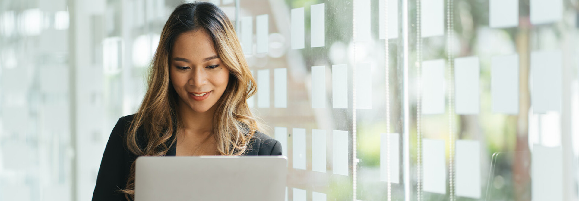 Person holding laptop