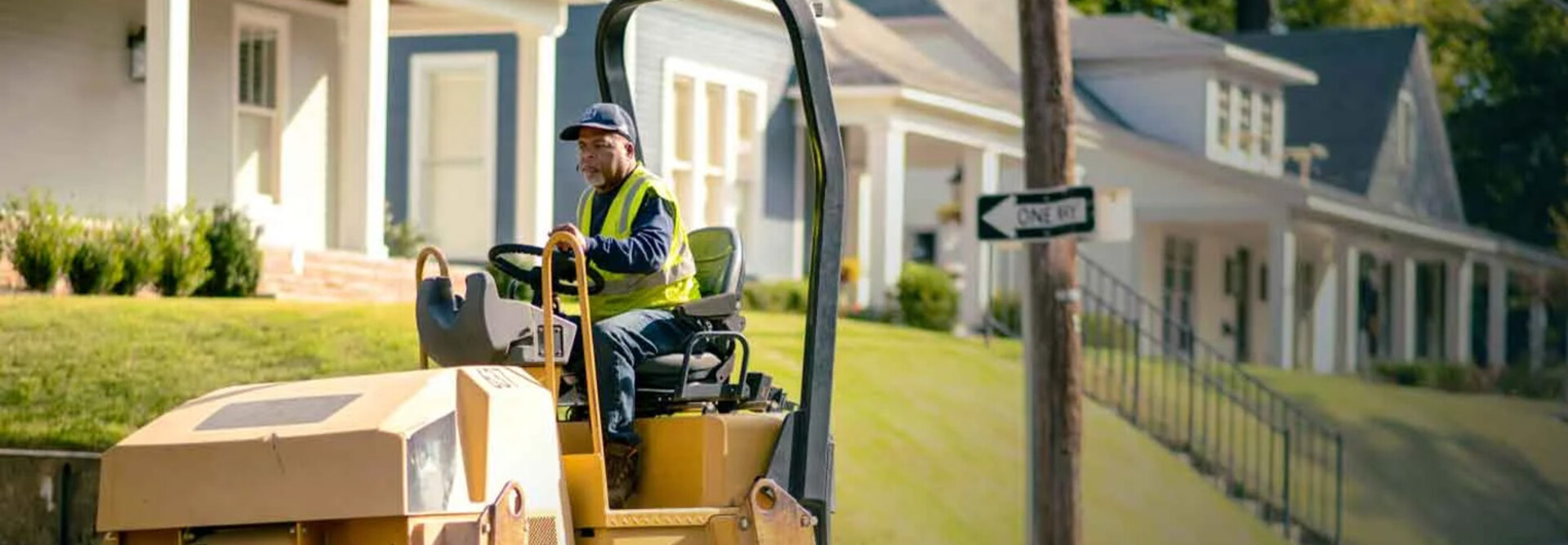 Person patching potholes