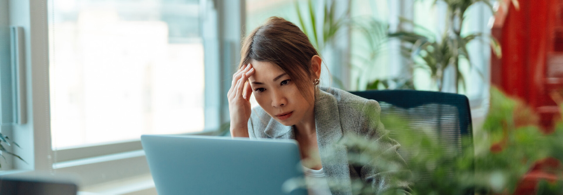 Frustrated person using computer