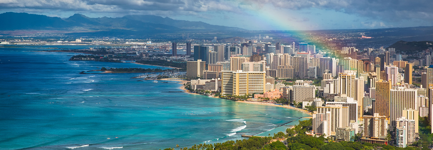 View of Honolulu harbor with a rainbow