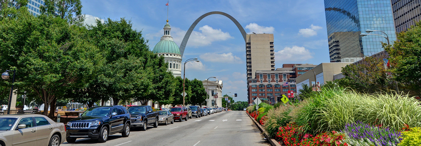 Downtown St. Louis with the Gateway Arch down the street 