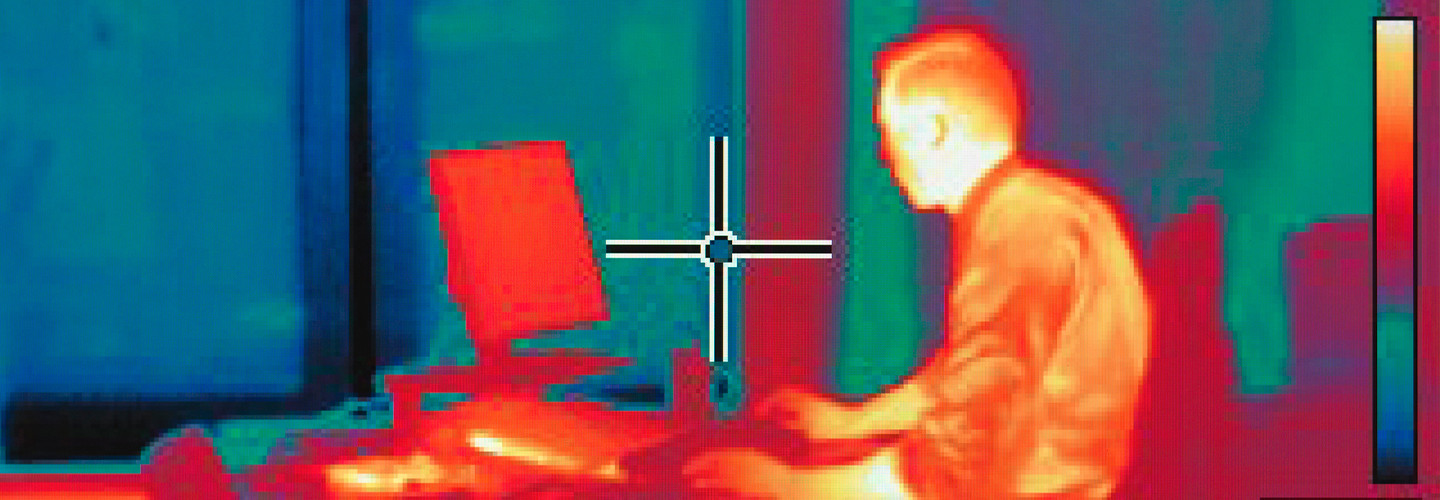 Thermal image man at desk