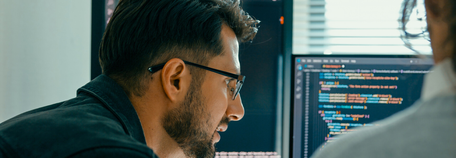 Person looking at code/data