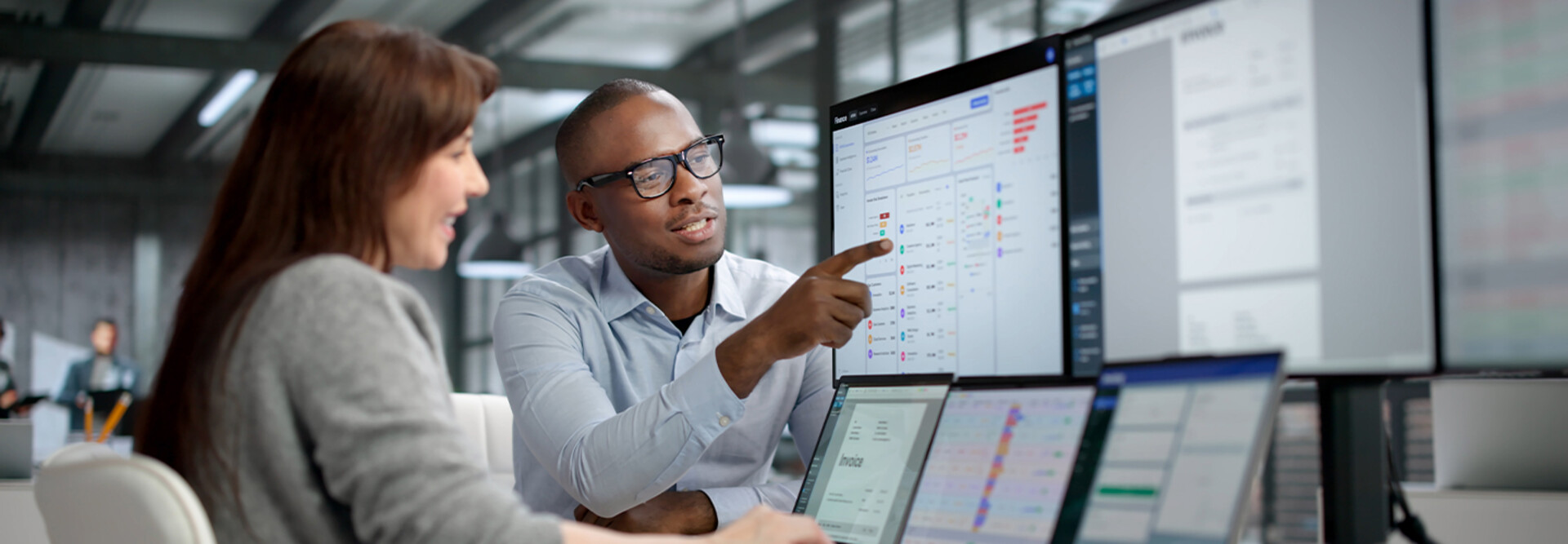 Coworkers reviewing data