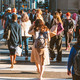 A group of people crossing the street