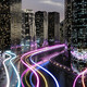 Smart city with glowing light trails