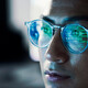 Code reflected in coder's glasses