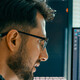 Person looking at code/data