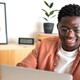 Person using laptop at home