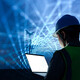 workman with laptop and data lights in the sky