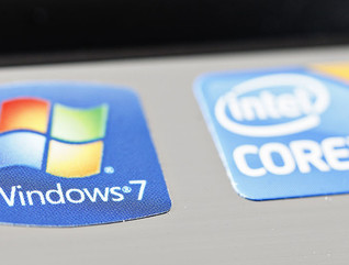 Windows and Intel stickers on laptop computer