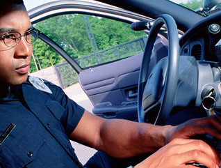 Police officer in car