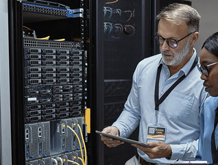 IT technicians in a server room