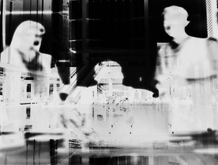 Negative image of people in a meeting