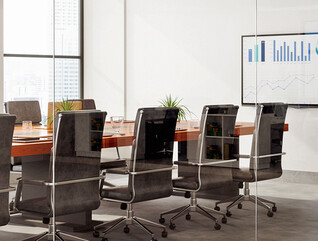 Outside View Of Empty Meeting Room With Table And Office Chairs