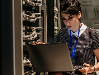 Person working in a server room
