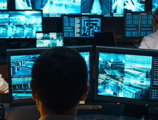 Guards in a security room