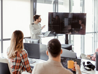 People learning coding on the job