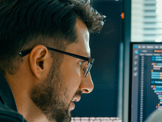 Person looking at code/data