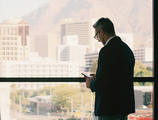 Person using phone in office